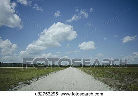 Stock Photography - View of empty dirty road . Fotosearch
