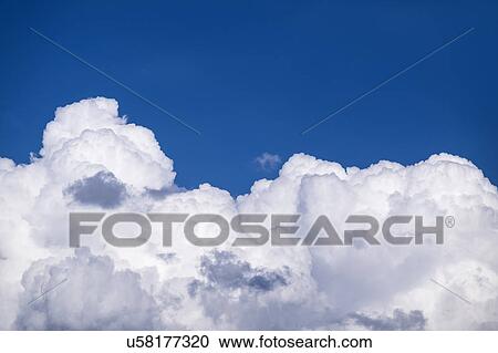 View of puffy cloud formations View Large Photo Image Stock Image - View of puffy cloud formations. Fotosearch