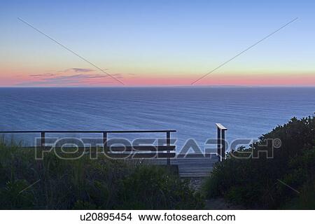 View of sea at dusk View Large Photo Image Picture - View of sea at dusk. Fotosearch