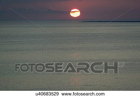 View of sunset sea View Large Photo Image Stock Photo - View of sunset sea. Fotosearch