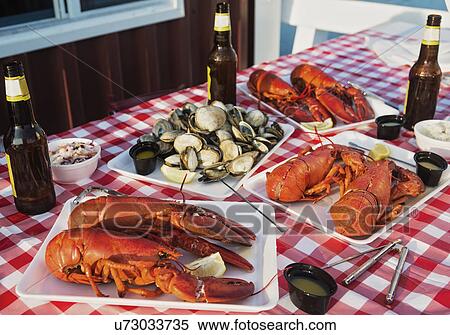 View of table with lobster meal View Large Photo Image Stock Photography - View of table with lobster meal. Fotosearch