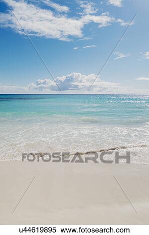View of tranquil tropical beach View Large Photo Image Stock Photography - View of tranquil tropical beach. Fotosearch