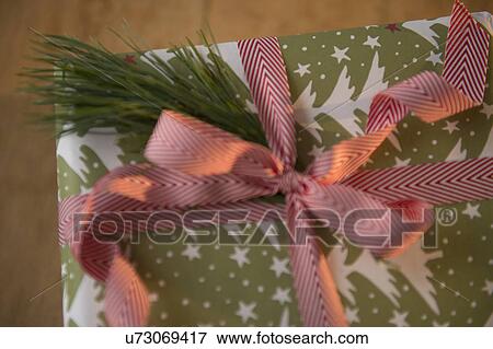 Stock Photo - View of wrapped Christmas gift. Fotosearch