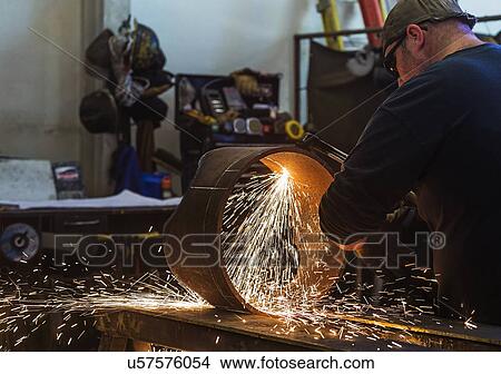 Welder working in metal workshop View Large Photo Image Picture - Welder working in metal workshop. Fotosearch