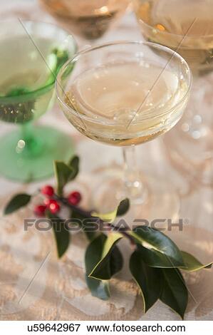 Wine glasses on festive table View Large Photo Image Stock Photo - Wine glasses on festive table. Fotosearch