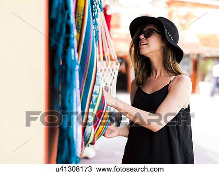 Woman at market View Large Photo Image Stock Image - Woman at market. Fotosearch