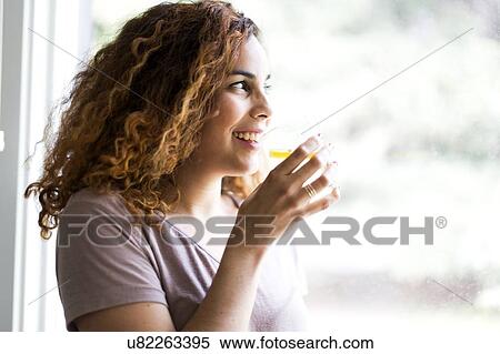 Stock Photography - Woman drinking water. Fotosearch