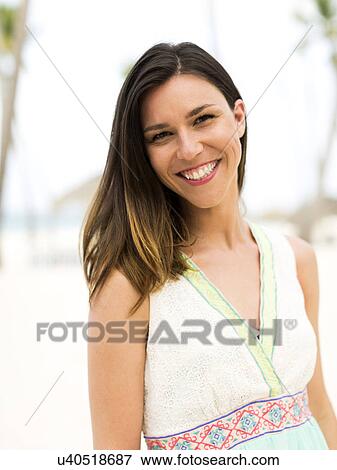 Woman in dress on beach View Large Photo Image Stock Photo - Woman in dress on beach. Fotosearch