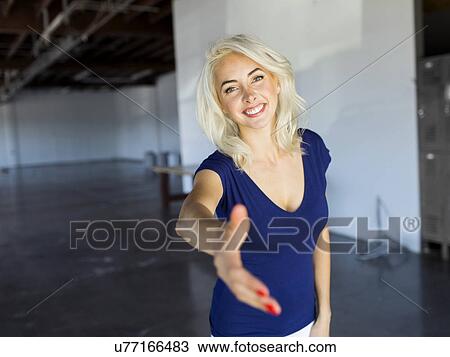 Woman in warehouse View Large Photo Image Stock Image - Woman in warehouse. Fotosearch