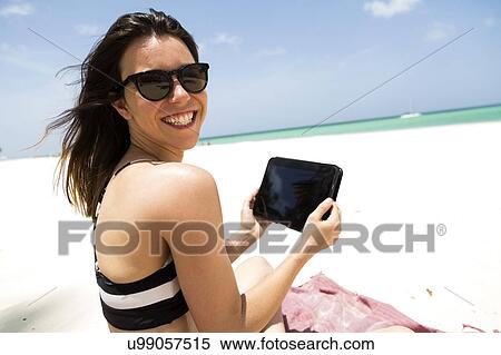 Woman on beach View Large Photo Image Stock Photography - Woman on beach. Fotosearch