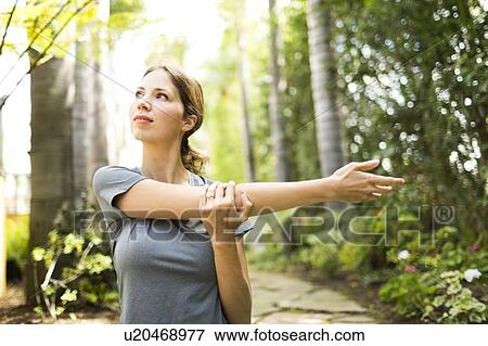 Woman practicing yoga View Large Photo Image Stock Photo - Woman practicing yoga. Fotosearch