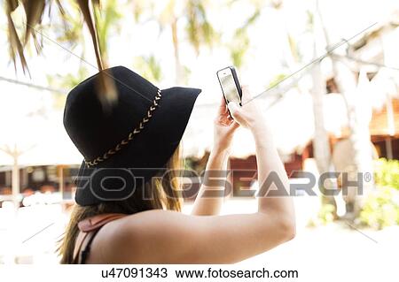 woman taking photo with smart phone View Large Photo Image Stock Image - woman taking photo with smart phone. Fotosearch