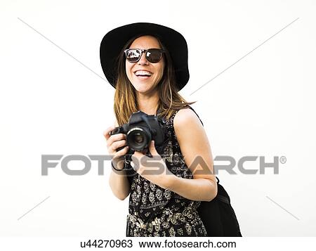 Woman taking photos during vacations View Large Photo Image Stock Image - Woman taking photos during vacations. Fotosearch