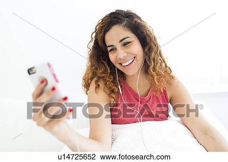 Woman using phone View Large Photo Image Stock Image - Woman using phone. Fotosearch
