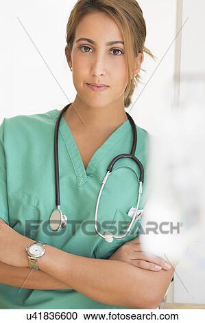 Stock Image - Young female doctor in hospital . Fotosearch