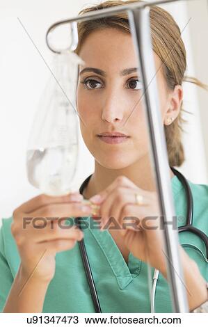 Stock Image - Young female doctor in hospital . Fotosearch