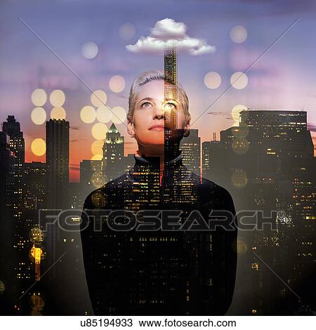 Young woman looking up at night View Large Photo Image Stock Image - Young woman looking up at night. Fotosearch