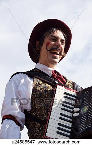 acordian player music man male on stilts act View Large Photo Image Stock Photo - acordian player music man male on stilts act. Fotosearch