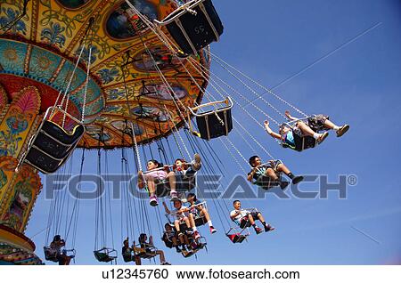 Stock Image -  aerial chair ride people kids children adults. Fotosearch