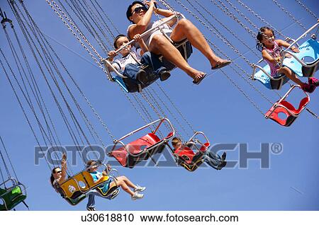 Stock Image -  aerial chair ride people kids children adults. Fotosearch