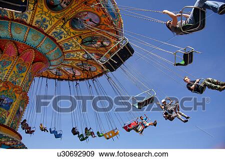 aerial chair ride people kids children adults View Large Photo Image Stock Photo - aerial chair ride people kids children adults. Fotosearch