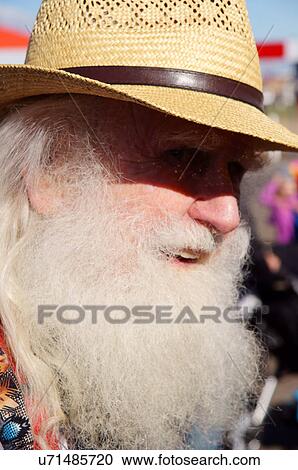 Stock Image -  albq balloon fiesta amish man male straw hat. Fotosearch