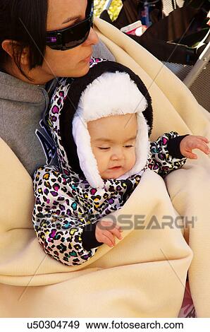 Stock Photo -  albq balloon fiesta baby mother blanket cold. Fotosearch