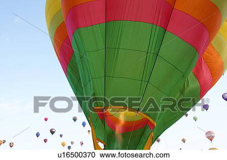 Stock Image -  albq balloon fiesta burning flame balloons hot. Fotosearch