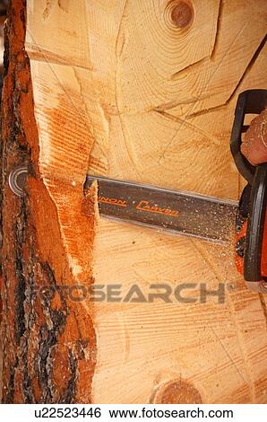 Stock Photograph -  albq balloon fiesta closeup wood carving chain. Fotosearch