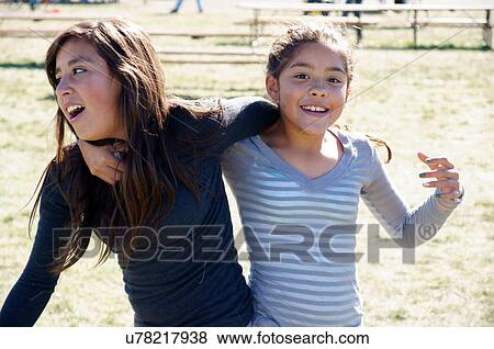 albq balloon fiesta cute latino hispanic girls View Large Photo Image Stock Photo - albq balloon fiesta cute latino hispanic girls. Fotosearch