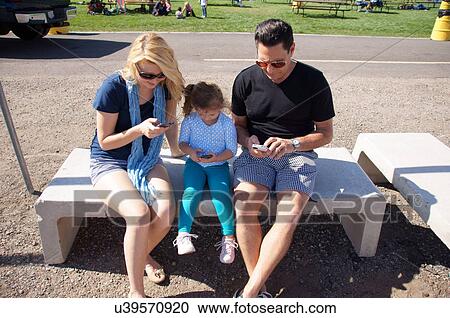 Stock Image -  albq balloon fiesta family texts together stays. Fotosearch