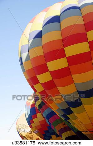 Stock Photography -  albq balloon fiesta hot-air ballons lined up. Fotosearch