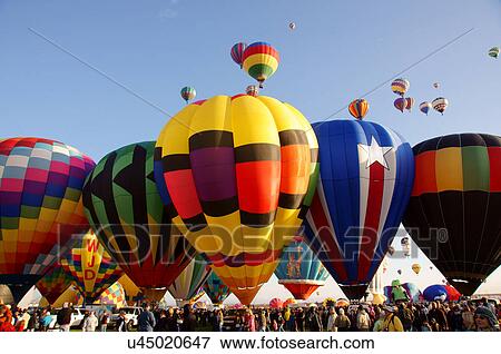 albq balloon fiesta hot-air balloons line crowd View Large Photo Image Stock Photo - albq balloon fiesta hot-air balloons line crowd. Fotosearch