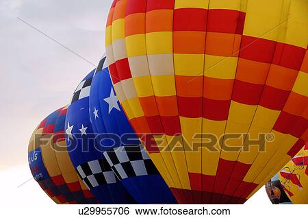 Stock Photograph -  albq balloon fiesta hot-air balloons lined up. Fotosearch