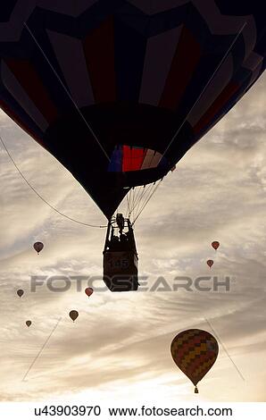 Stock Image -  albq balloon fiesta hot-air pre-dawn sky dawn. Fotosearch