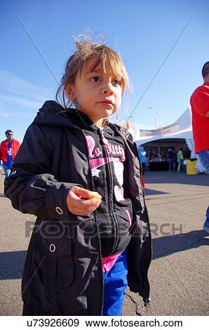 Stock Photo -  albq balloon fiesta latino hispanic girl child. Fotosearch