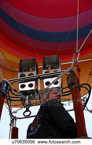 Stock Photograph -  albq balloon fiesta male driver hot-air showing. Fotosearch