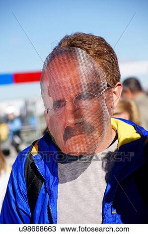 Stock Image -  albq balloon fiesta man male wearing mask senior. Fotosearch