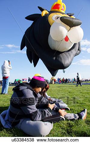 Stock Photo -  albq balloon fiesta native american teen couple. Fotosearch