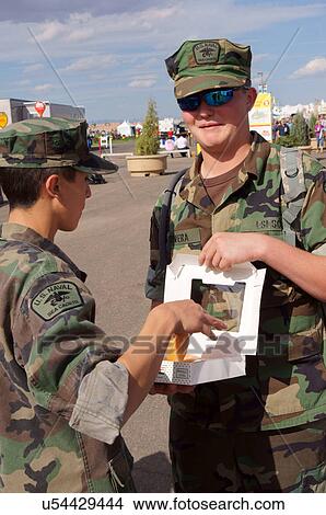 albq balloon fiesta naval sea cadet handing out View Large Photo Image Picture - albq balloon fiesta naval sea cadet handing out. Fotosearch
