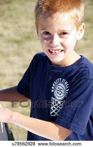 Stock Photo -  albq balloon fiesta portrait headshot young boy. Fotosearch