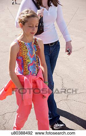 albq balloon fiesta shy girl child kid walking View Large Photo Image Stock Image - albq balloon fiesta shy girl child kid walking. Fotosearch