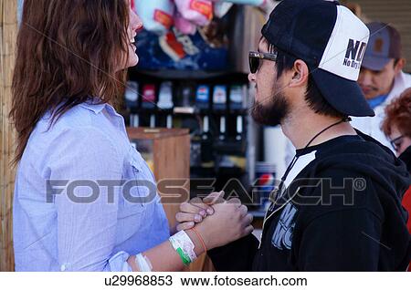 Stock Image -  albq balloon fiesta teen teenager couple holding. Fotosearch