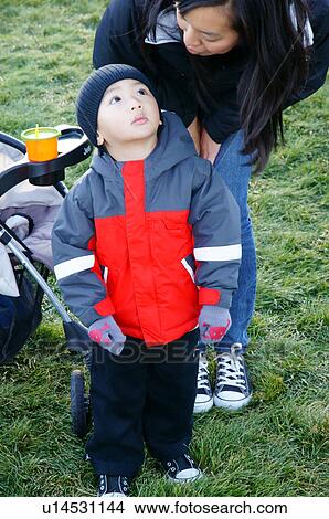 Picture -  albq balloon fiesta young asian boy toddler up. Fotosearch