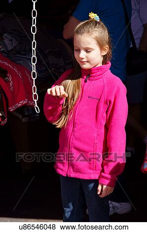 albq balloon fiesta young blond girl swiinging View Large Photo Image Stock Photo - albq balloon fiesta young blond girl swiinging. Fotosearch