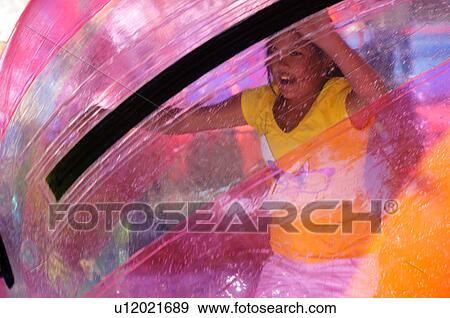 Stock Photo -  asian girl child kid teen teenager trapped in. Fotosearch