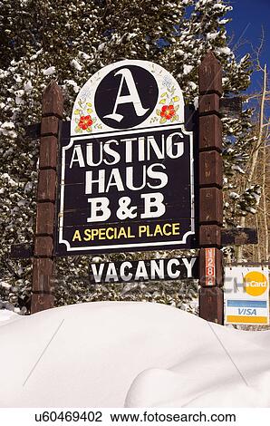 Stock Image -  austing house sign highway 150 taos ski valley. Fotosearch