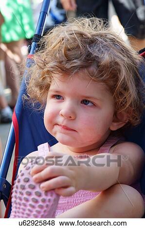 Stock Photo -  baby girl female kid child children kids candid. Fotosearch