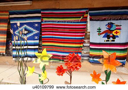 blankets and lawn ornaments taos new mexico nm View Large Photo Image Stock Photo - blankets and lawn ornaments taos new mexico nm. Fotosearch