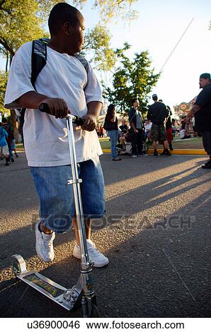 boy african american on street with push bike View Large Photo Image Stock Photograph - boy african american on street with push bike. Fotosearch